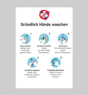 Hinweisschild 'Hände waschen gegen COVID-19' an der Wand